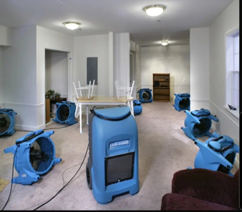 Air movers and dehumidifier setup for Water Damage Restoration in Russellville